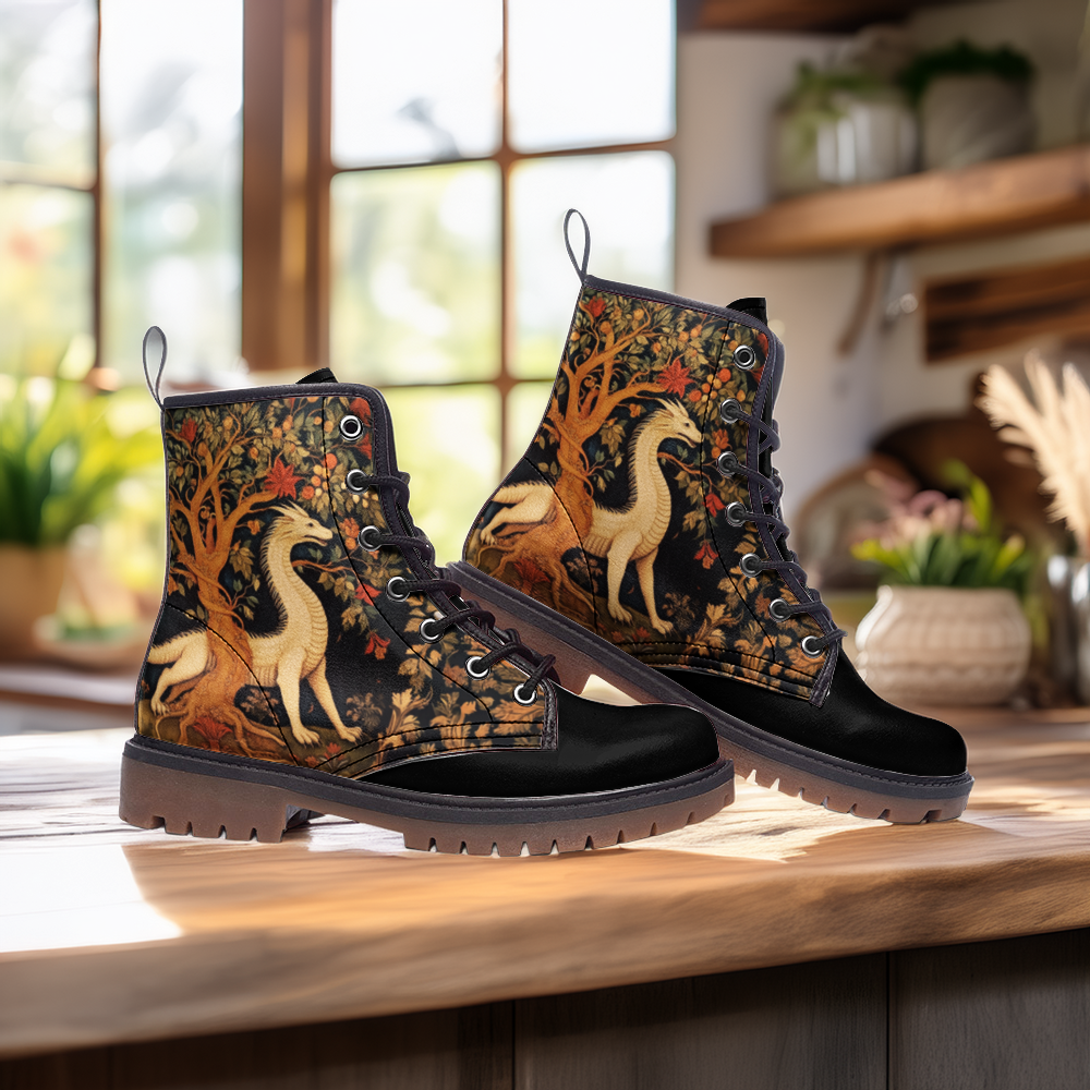 Pair of black boots with medieval
dragon-themed design  